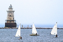 Sailing around Stamford Harbor Light in the fog.